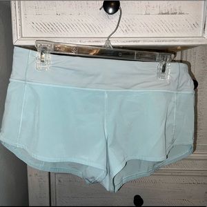 Light blue lulu shorts. Minor pen Knick on the left side in the picture. Size 8